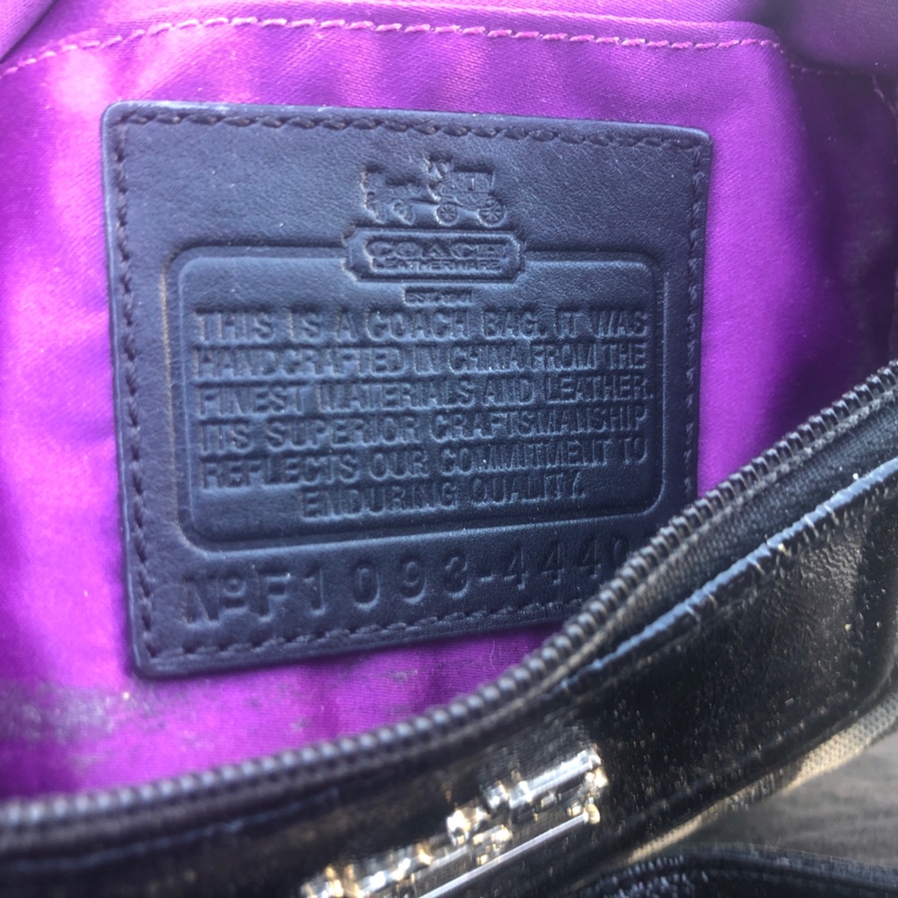 Coach Black Leather Handbag with Purple Interior